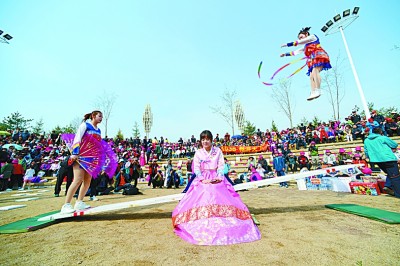 幸福花开迎远客——吉林省和龙市金达莱村的脱贫之路