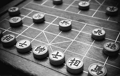 小棋局大世界：东西方象棋中的文化特质