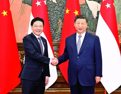 习近平会见新加坡总理黄循财